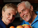 Kathy and Gord Rayner show off some of the fruit the vegans and Seventh Day Adventists keep on hand at their home.