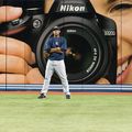 New York Yankees starting pitcher Ivan Nova waits in the outfield to catch fly balls during batting practice before a game against the Toronto Blue Jays on Sept. 19 at  the Rogers Centre in Ontario.