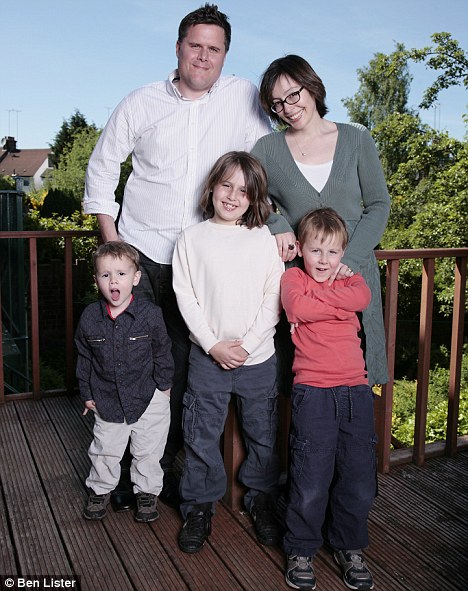 Back from the brink: Philip with wife Anna and their children